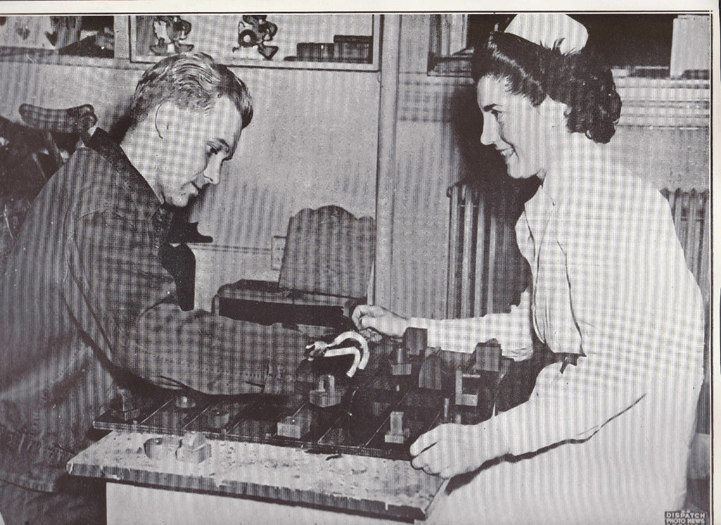 Solider Learning to Use Artificial Fingers  WWII Dispatch Photo News Service  0