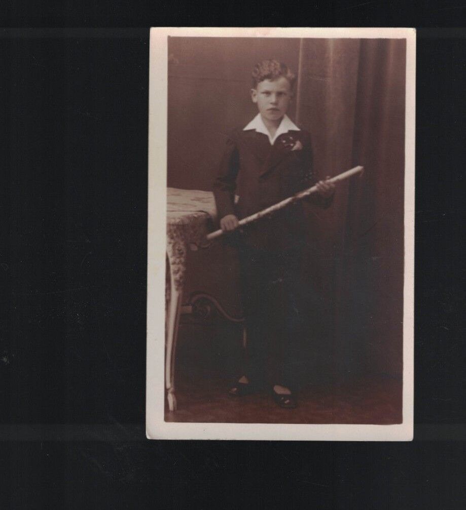 Upset Little Boy Holding a Stick or Switch RPPC Unused Postcard